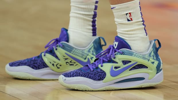 VIew of blue and green Nike KD shoes.